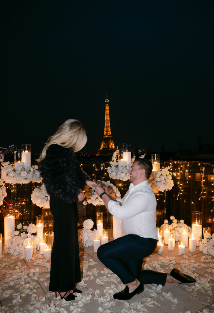 Proposal on a flowered rooftop in front of the Eiffel Tower
