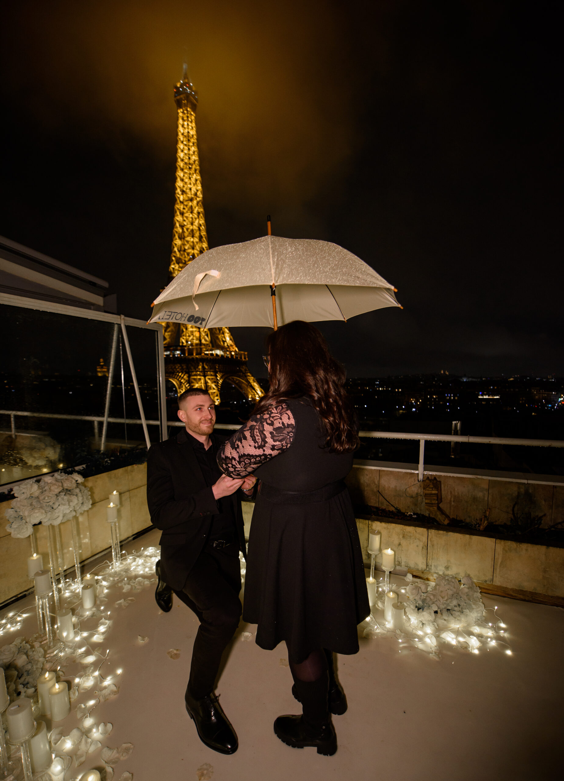 Romantic proposal under the rain